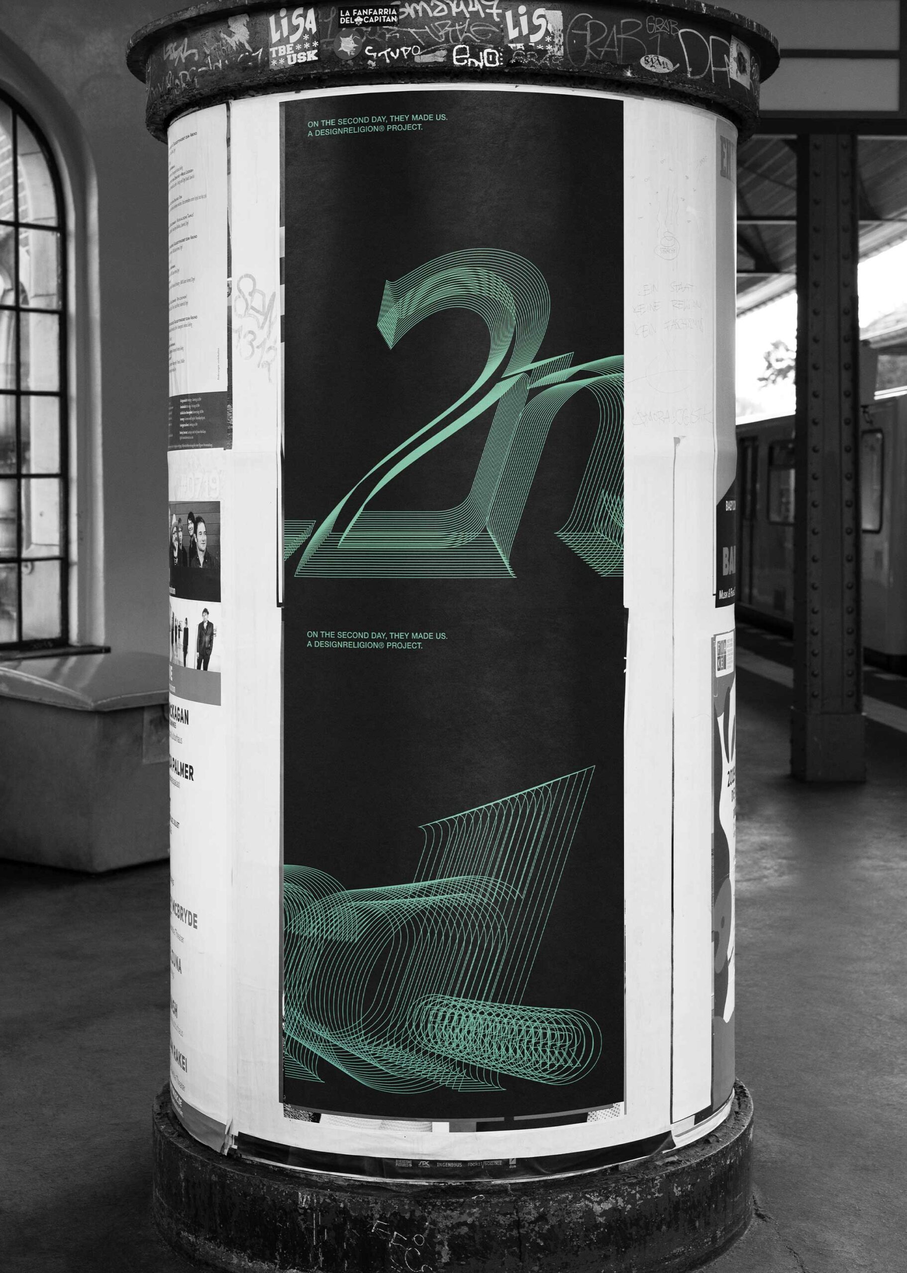 Creative poster design on a train station pillar using the Second Day branding identity